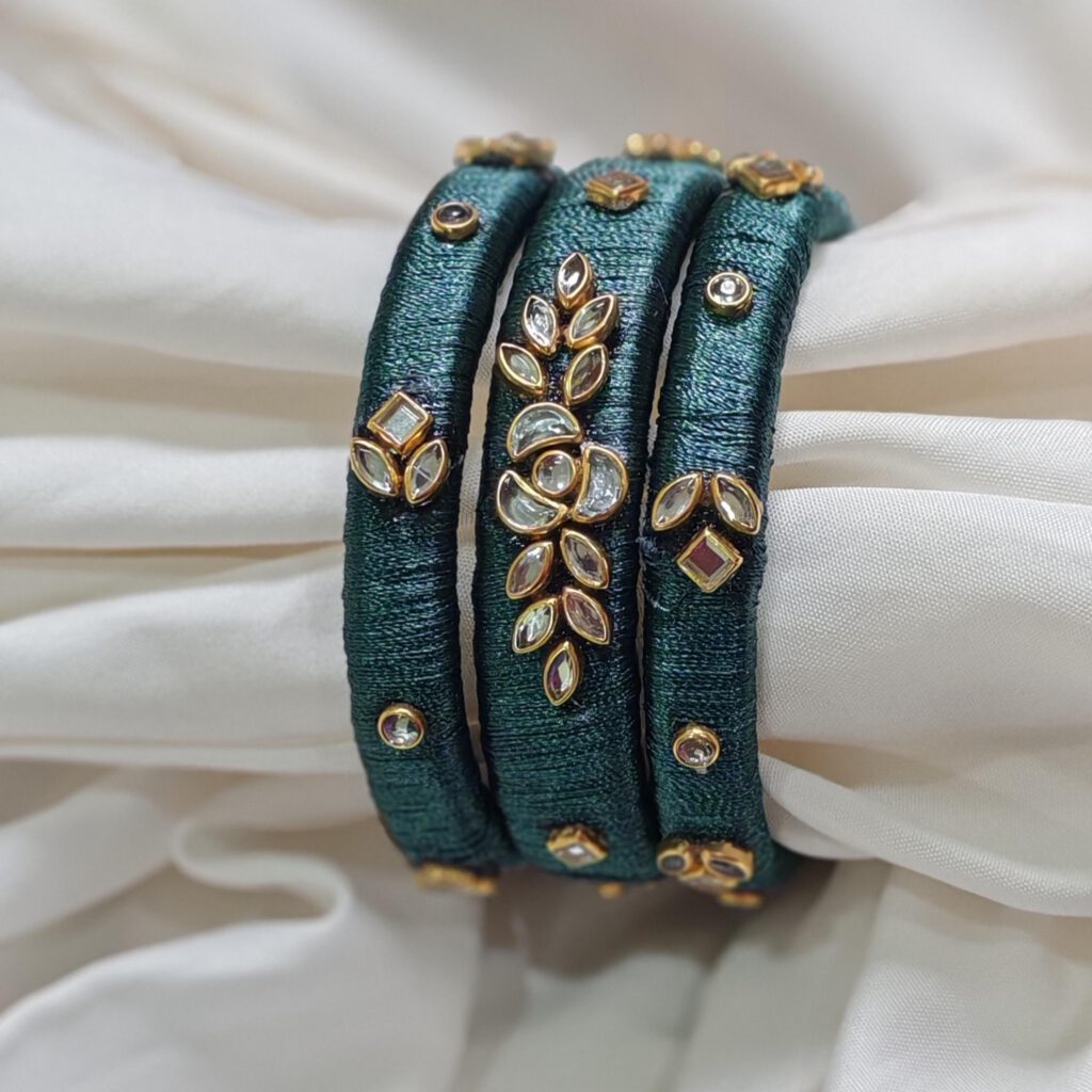 Teal silk thread bangles with kundan leaf motif