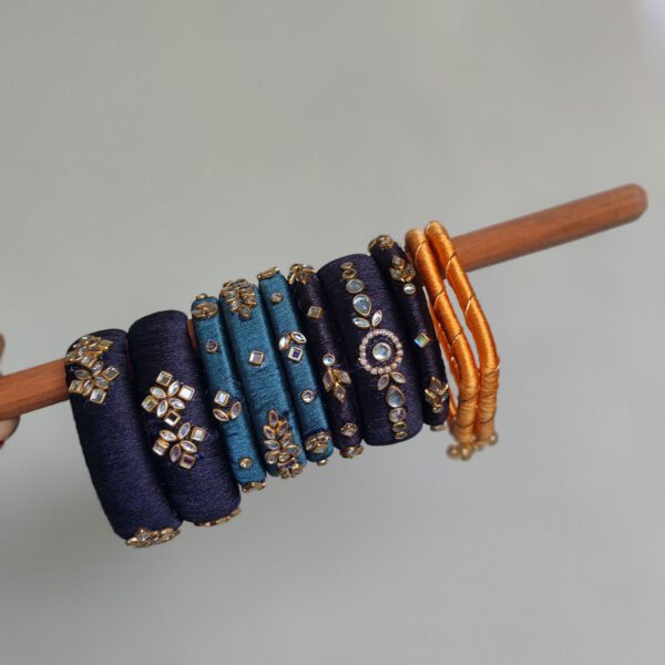 Navy, teal and mustard silk thread bangle stack